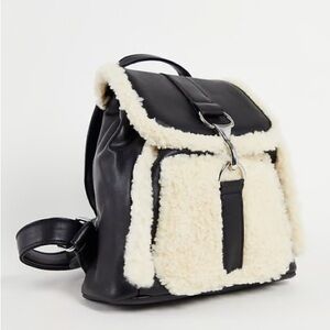 ASOS DESIGN backpack in cream fleece mix
